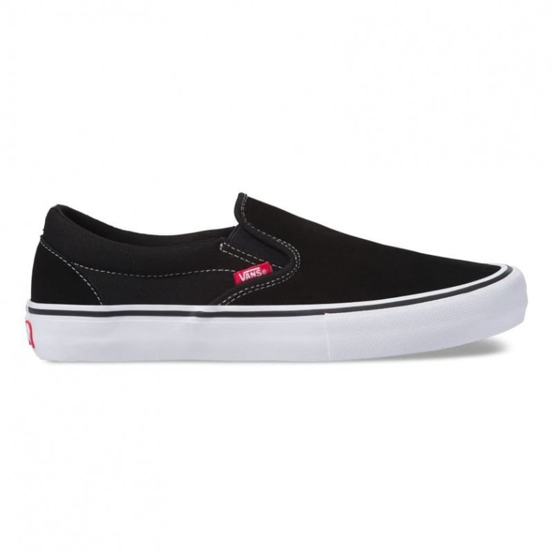 white slip on vans pro