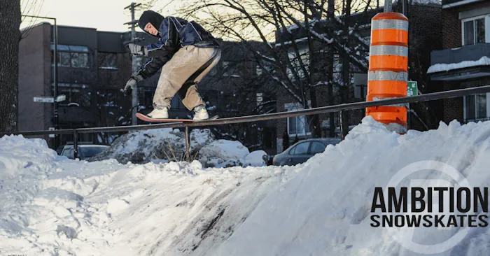 Snow skater on a rail