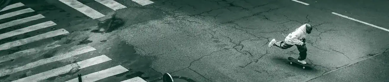 Guy skating the street