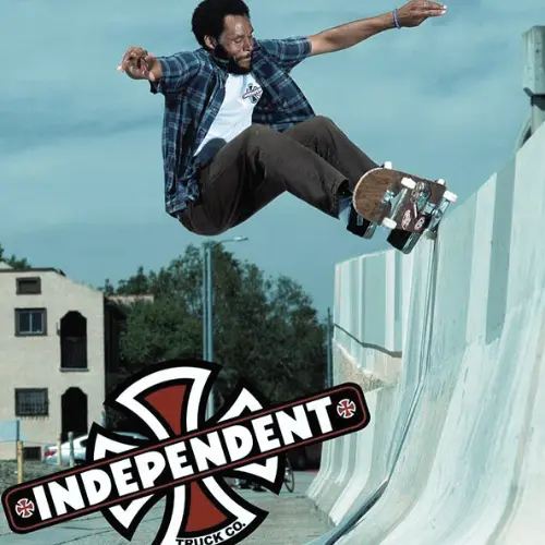 A guy riding a Carver board on the boulevard